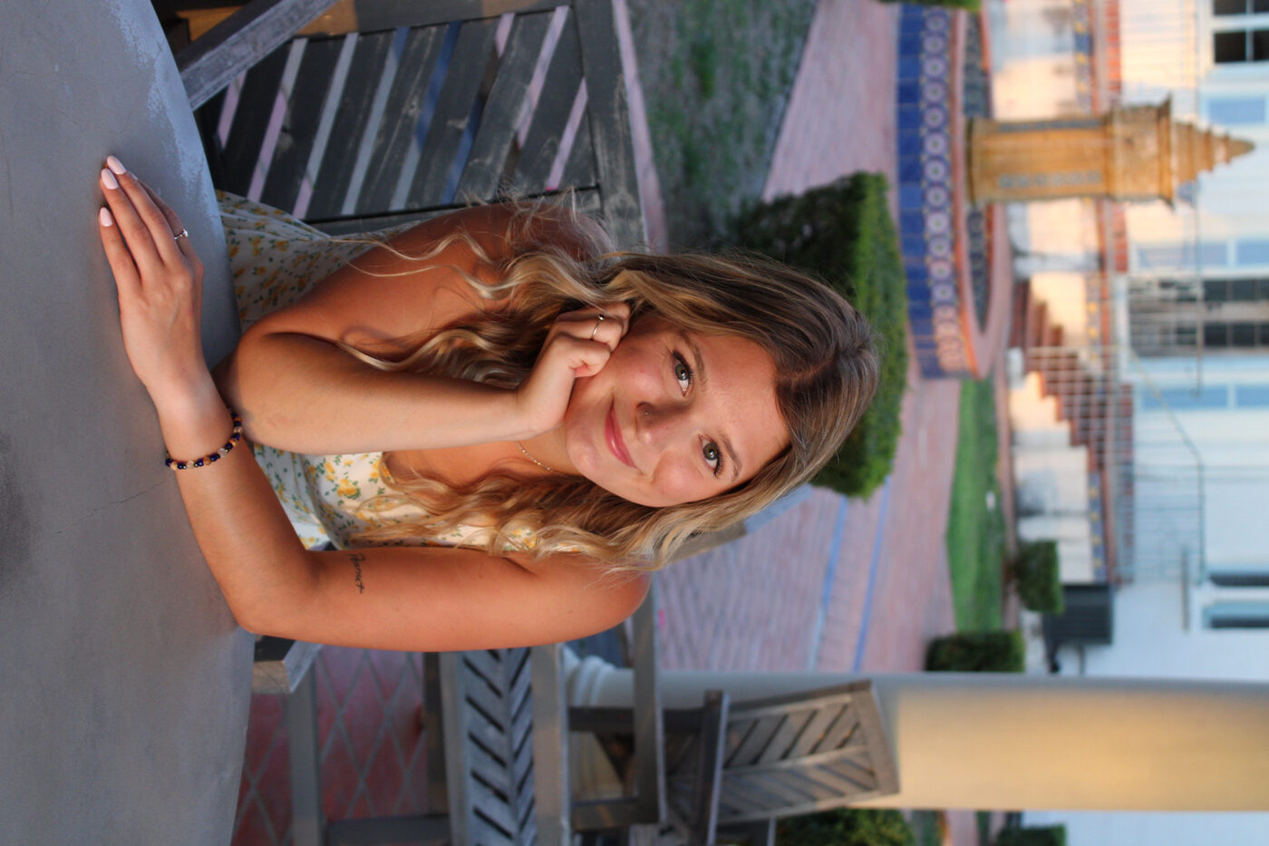 Portrait at a table, warm evening light