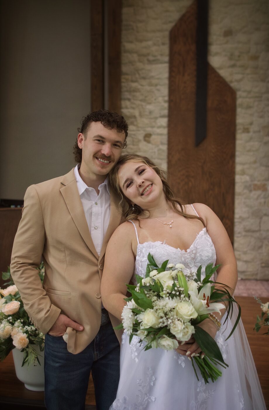 Bride and groom portrait with bouquet